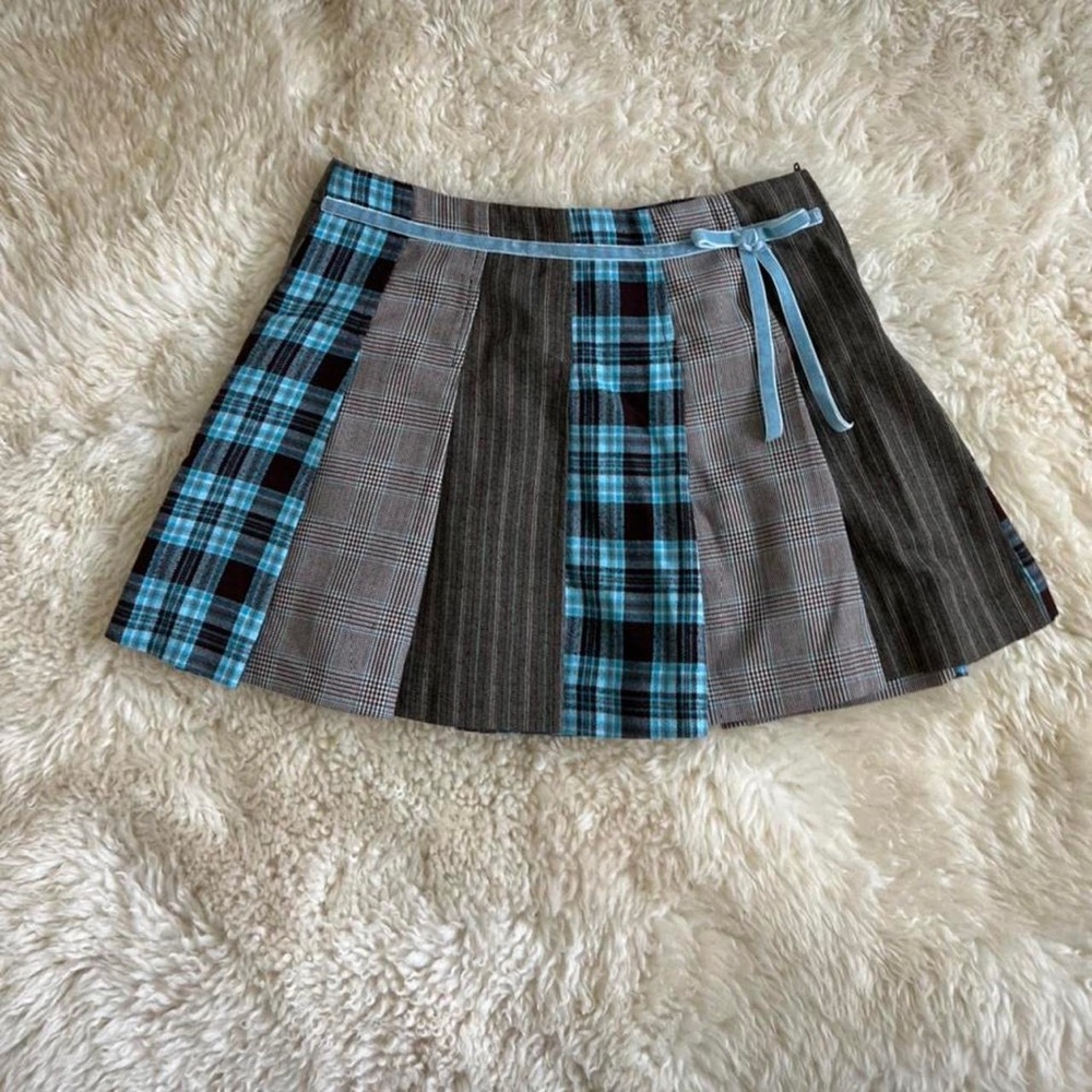 amy. byer plaid skirt with 3 different plaid pleats!